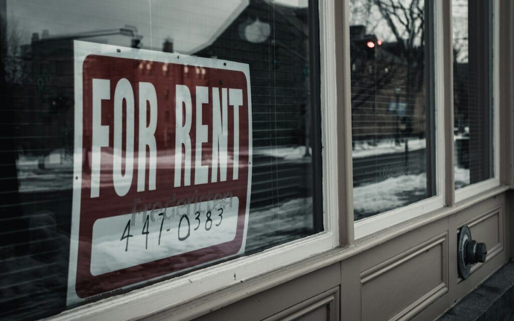 For rent sign in a window