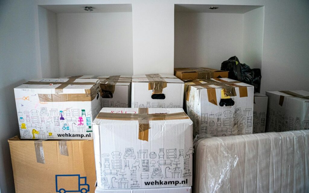 Cardboard boxes stacked during an office move