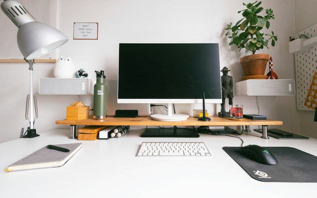 Tidy office desk with monitor and keyboard