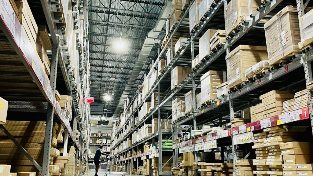 Long warehouse aisle with high racking